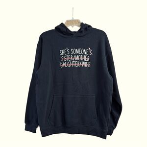 Wear the Peace “She’s Someone” Black Graphic Hoodie, Medium (Unisex)